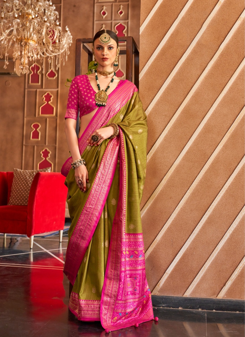 Traditional and designer silk saree in mehndi green