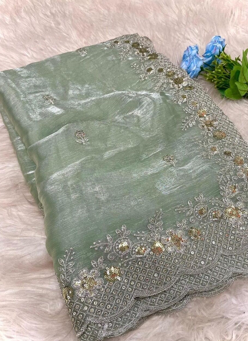 Beautiful zimmy choo silk saree with heavy embroidery in pastel green