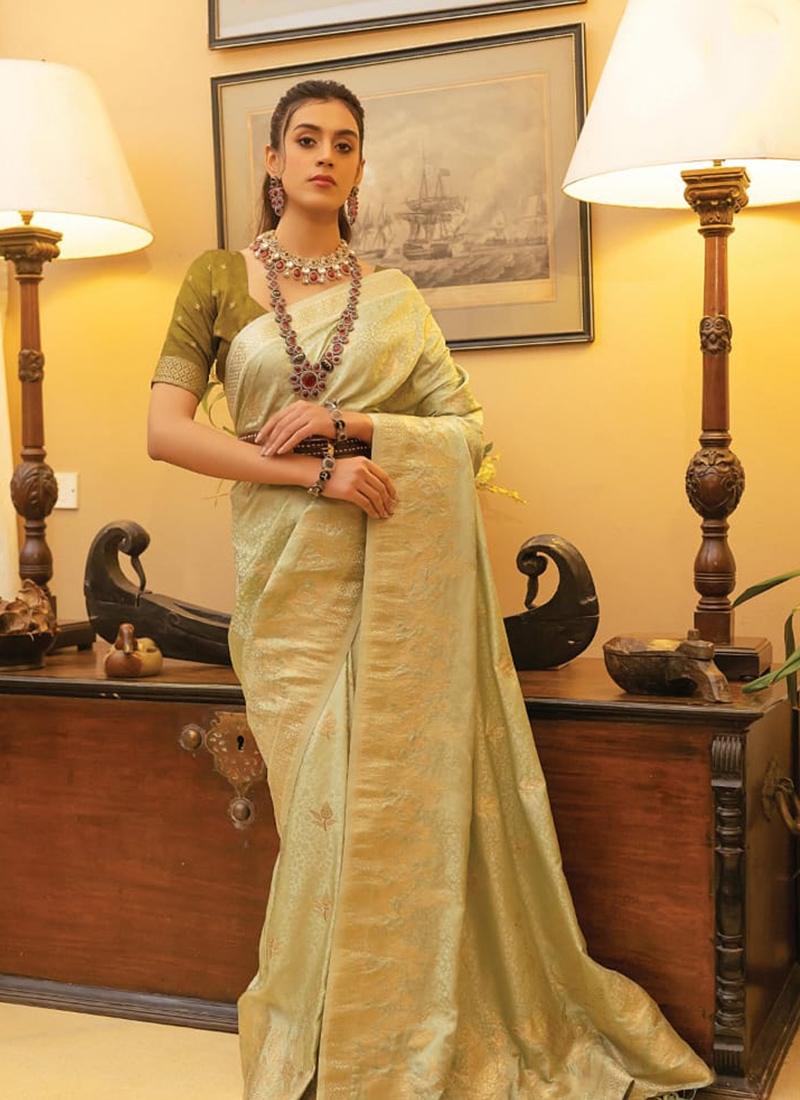 Trendy satin silk saree with hand weaving in pastel green