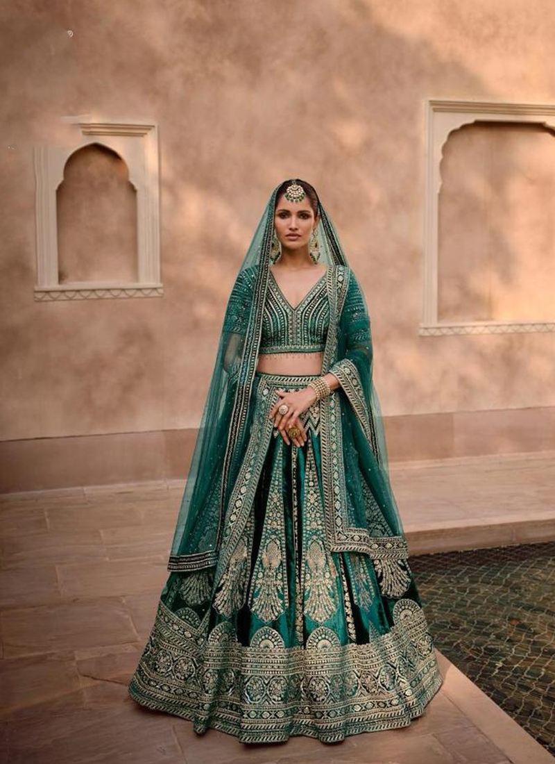 Pure viscose silk lehenga with crystal work in green