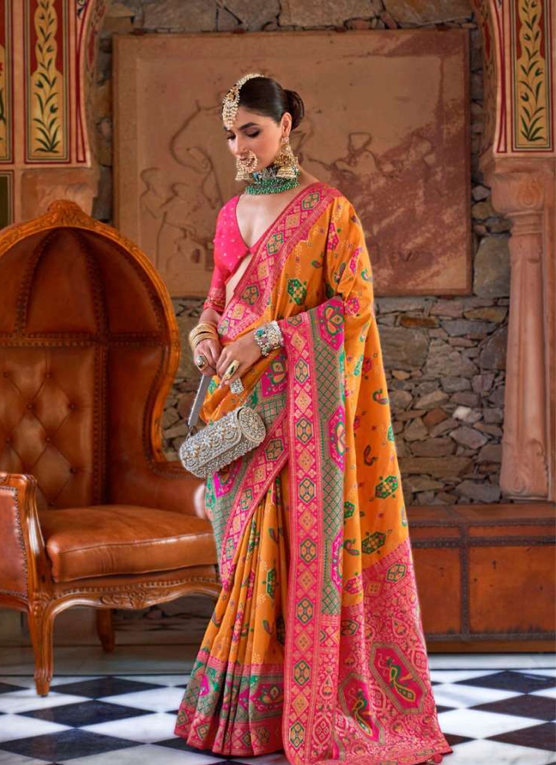 New exquisite banarasi silk saree with traditional design in orange