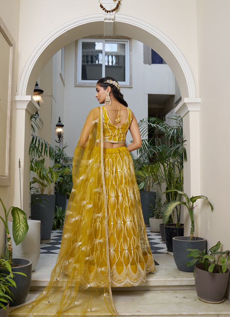 New butterfly net lehenga with heavy thread embroidery in yellow