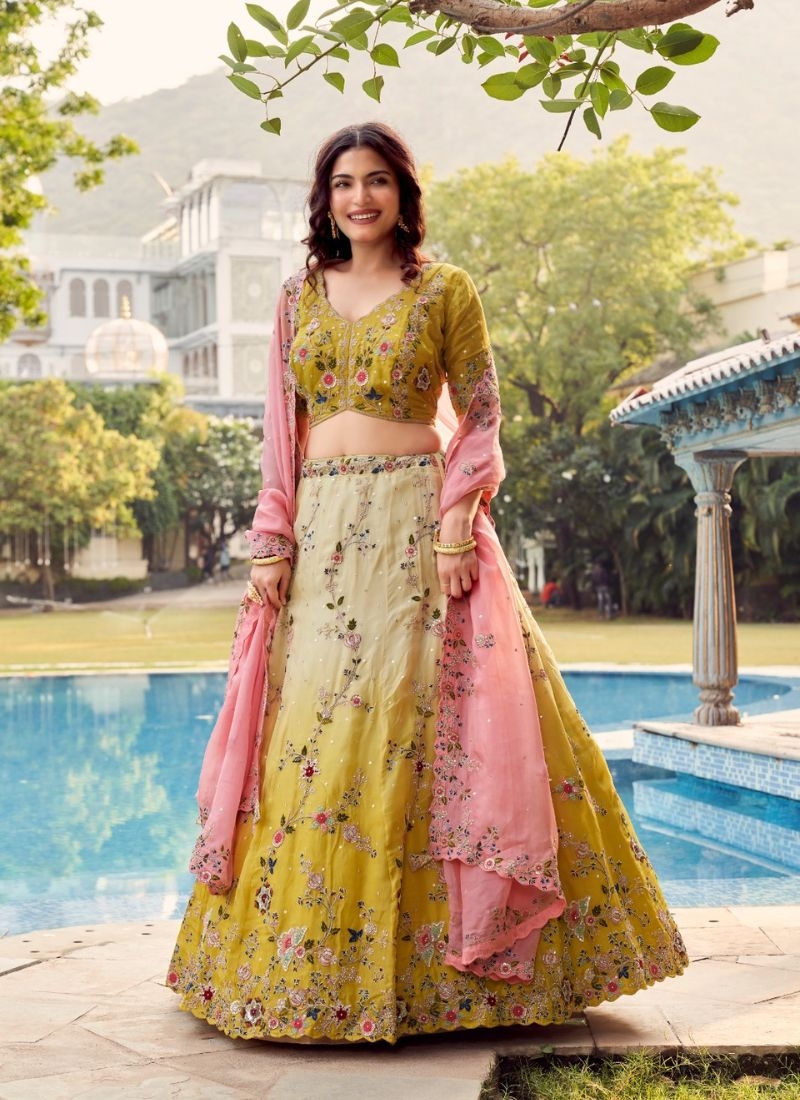 Beautiful lehenga choli with mirror and stone work in green