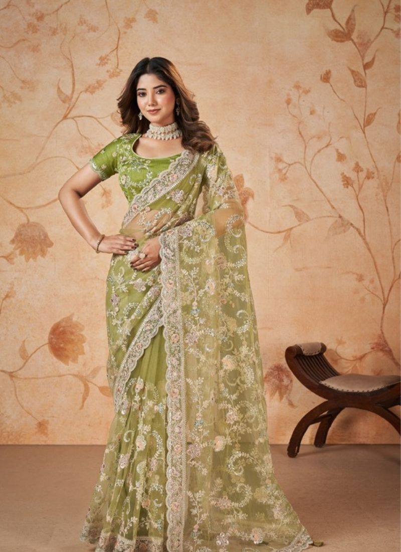 Beautiful net saree with cord embroidered in parrot green