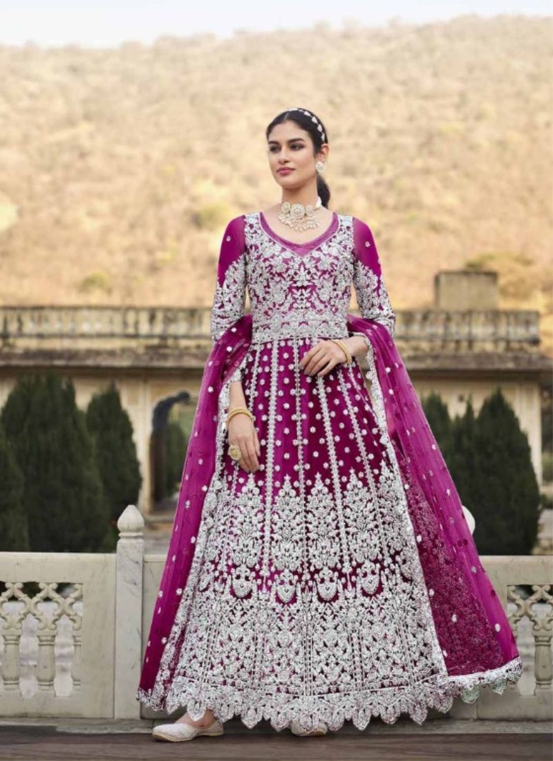 Beautiful butterfly net anarkali with stone work in wine