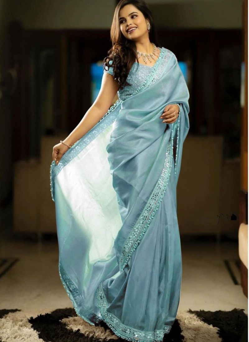 Trendy tissue silk saree with mirror work in light blue