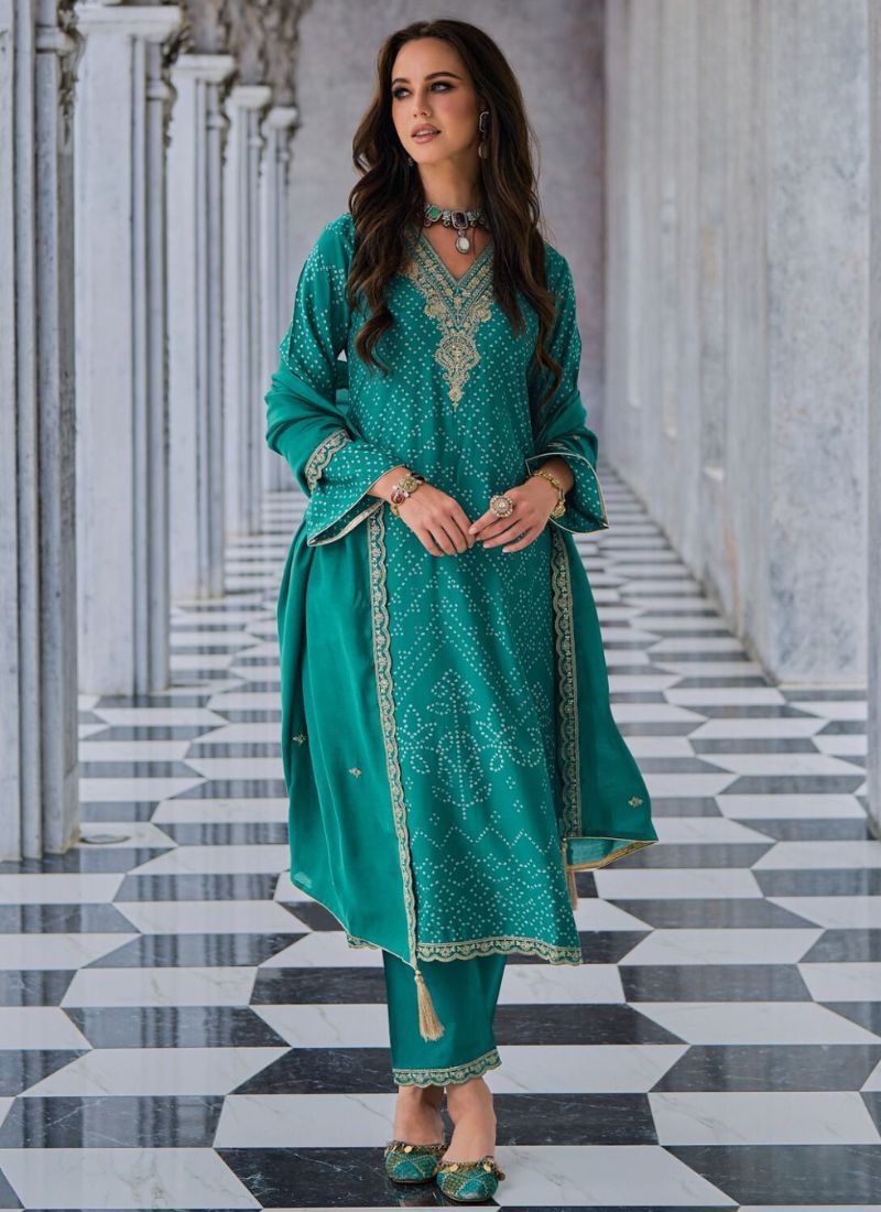 Trendy silk kurta pant suit with printed dupatta in green