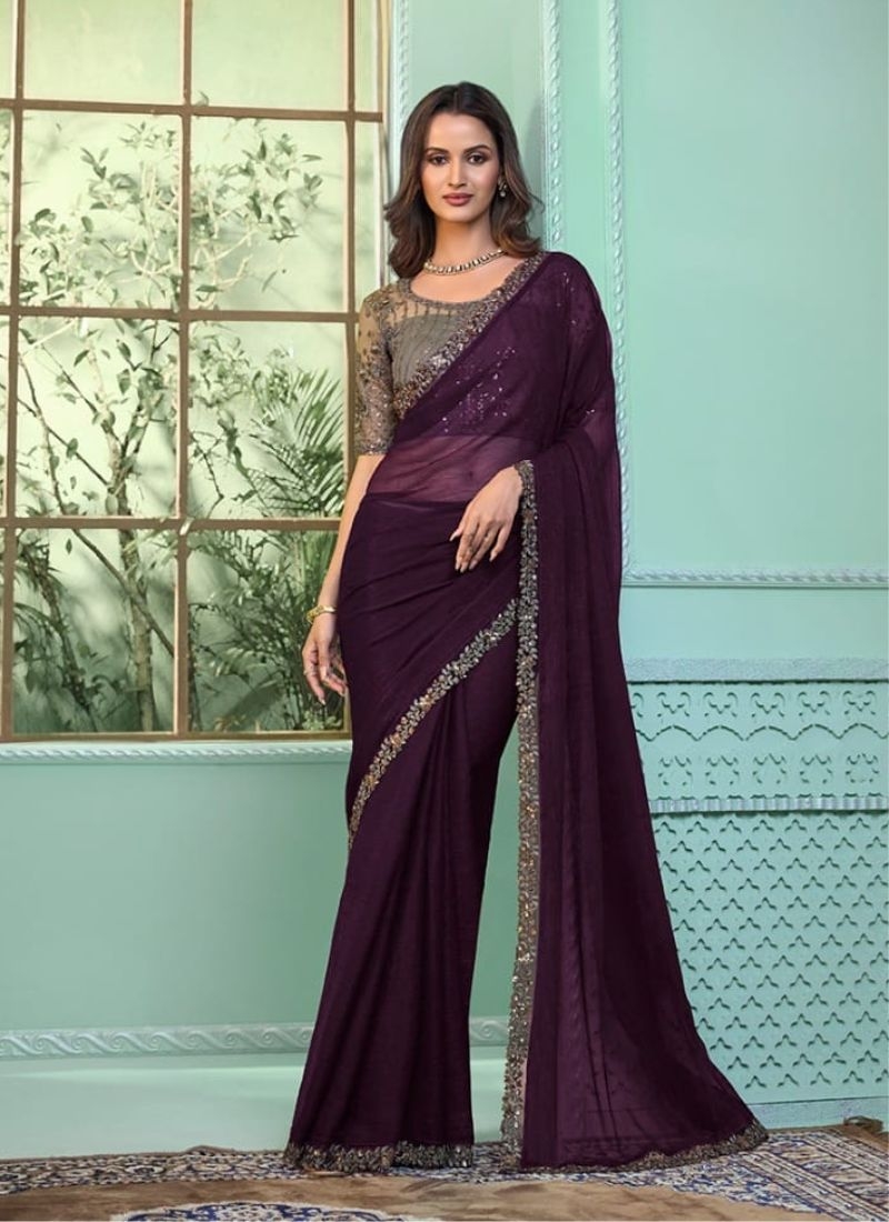 Premium designer saree with beautiful blouse in wine