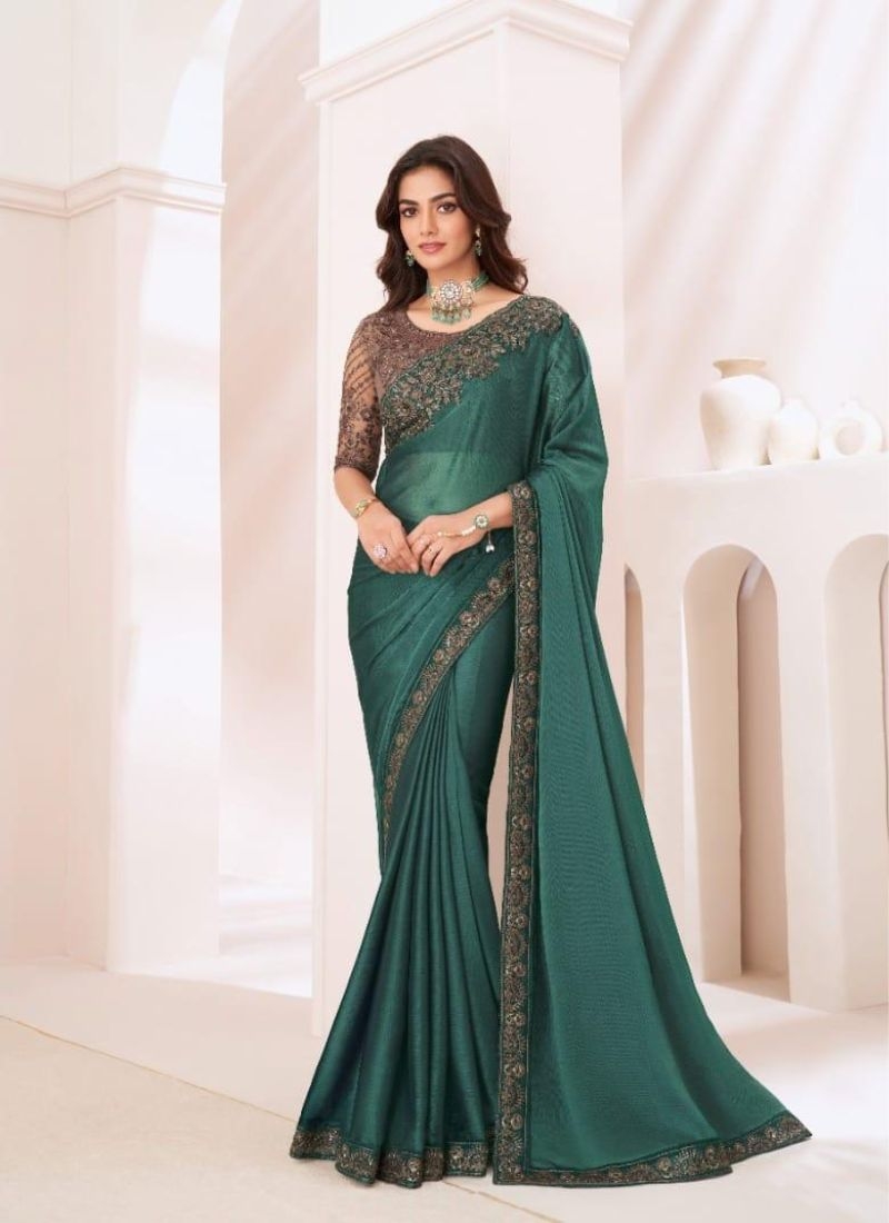 Designer silk saree with embroidered blouse in dark green