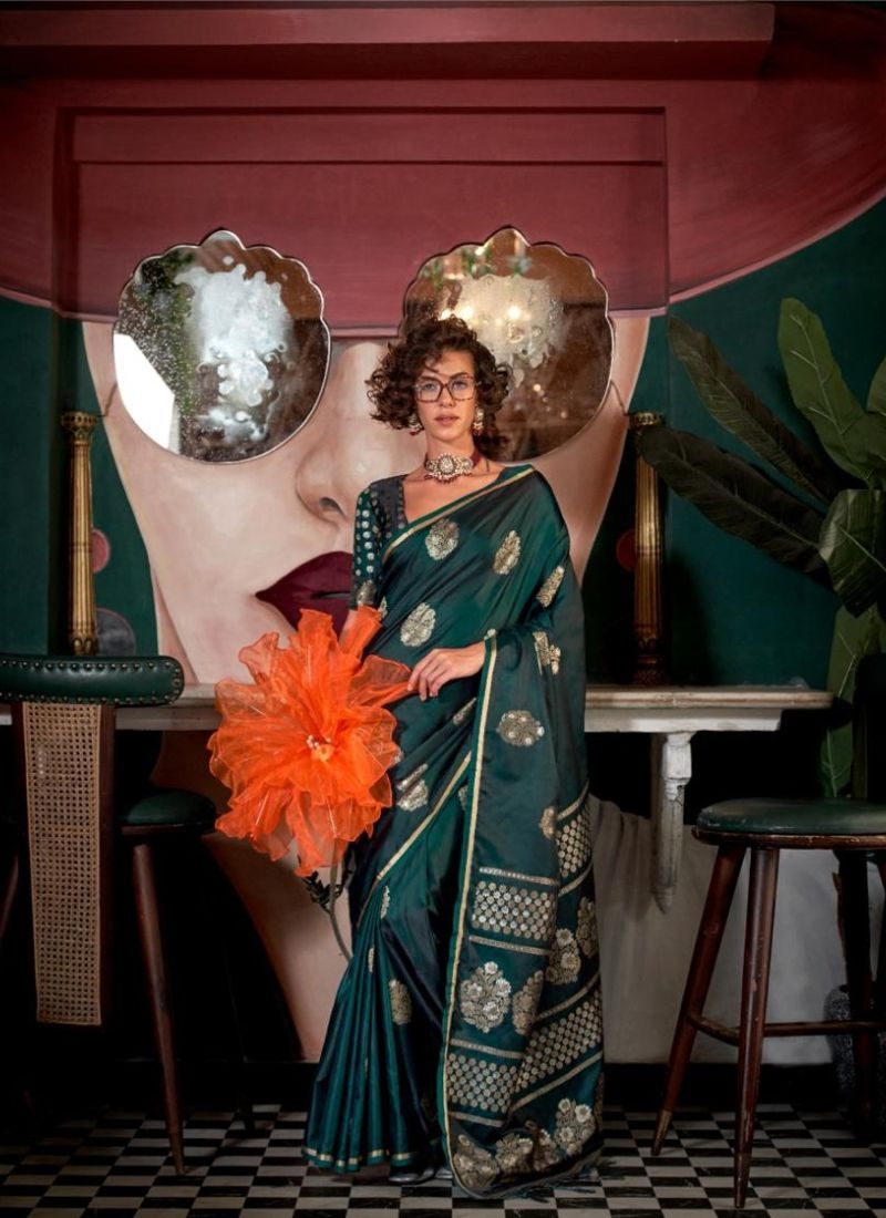 Exquisite satin silk saree with brocade blouse in dark green