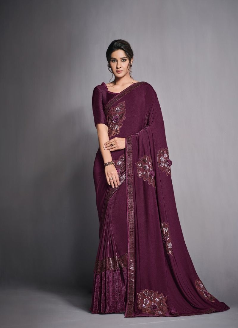 Exquisite wedding saree with embroidered blouse in wine