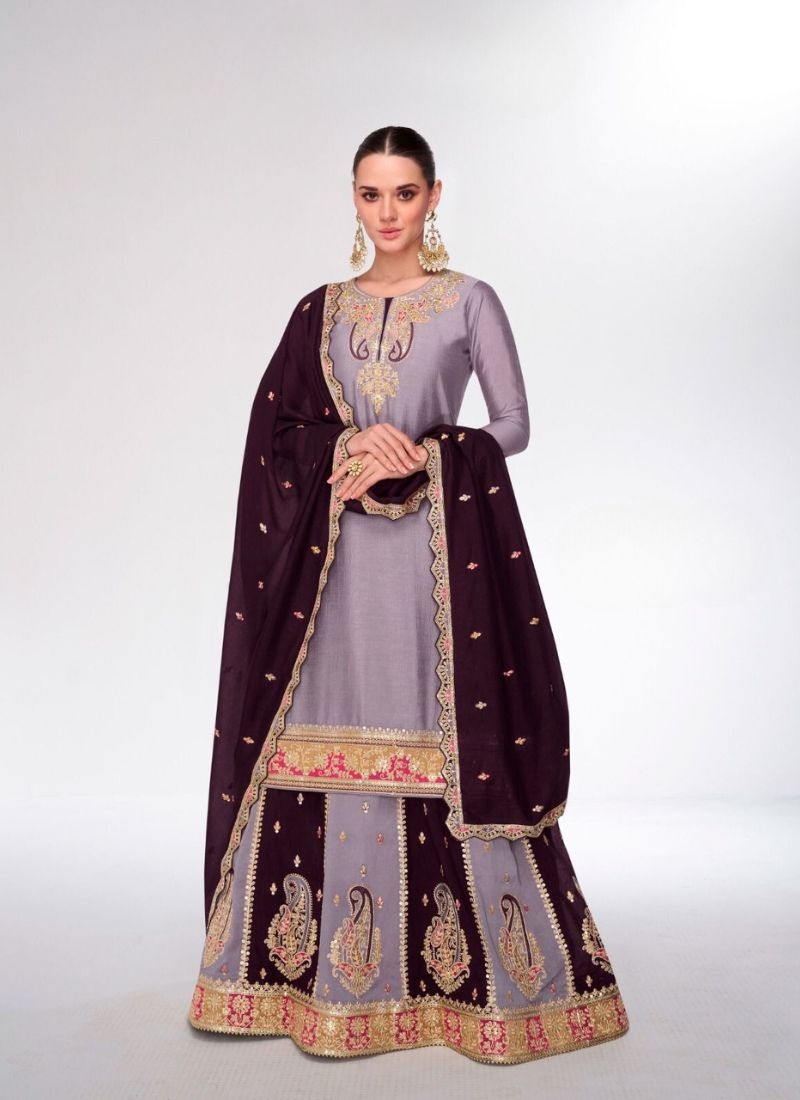 Beautiful sharara suit with heavy embroidery in purple