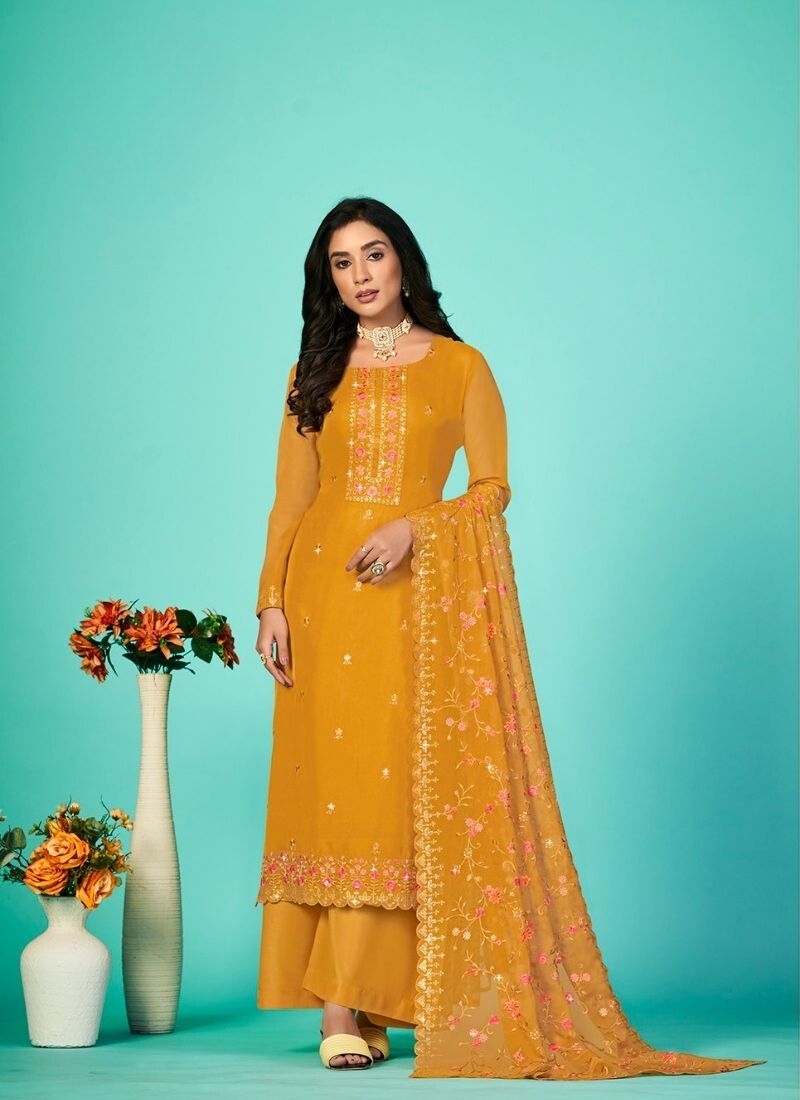 Stunning heavy embroidered georgette palazzo suit in yellow