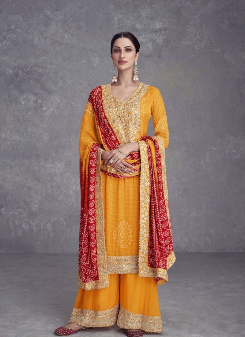 Stunning embroidered palazzo suit with printed dupatta in orange