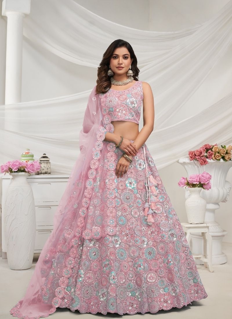 Stunning Sapphire Blue lehenga well crafted floral embellishments in light pink