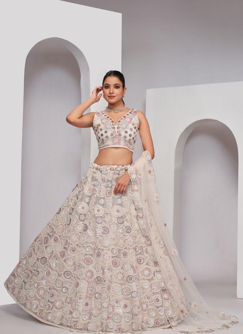 Dazzling White Lehenga: Blossoming Florals and classy Embellishments in perl white