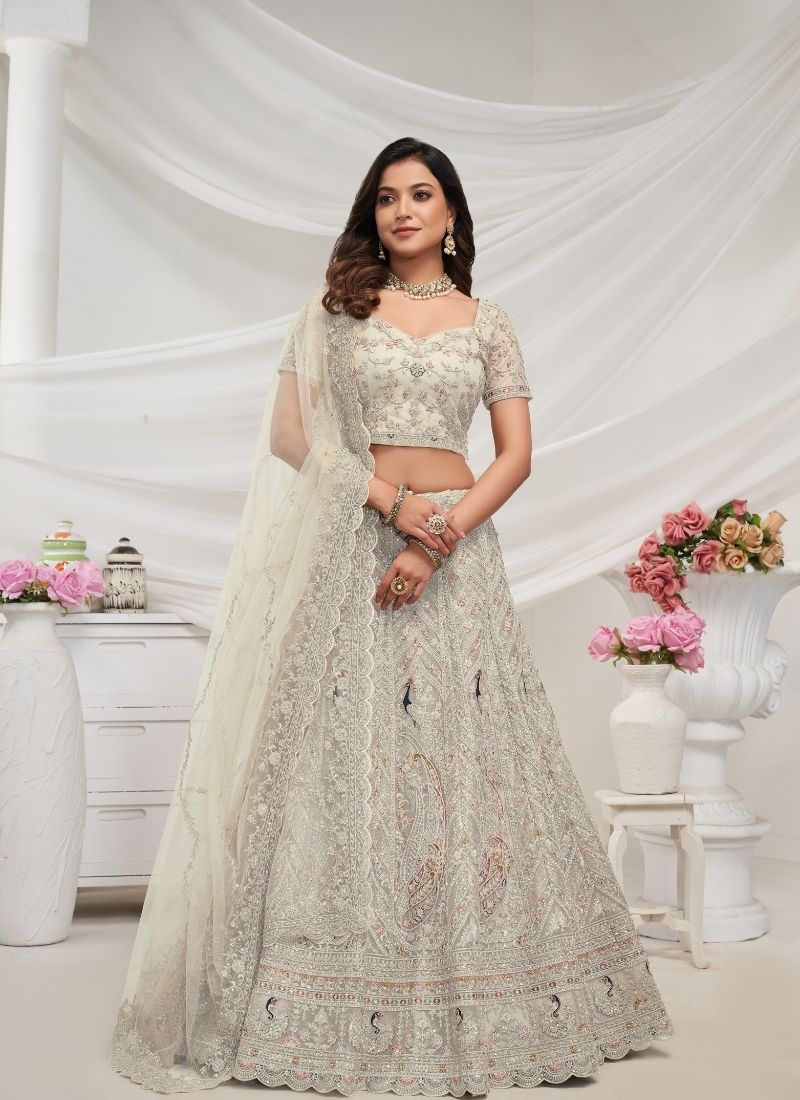 The bagh collection: white fawn peacock Embroidered bridal lehenga in white