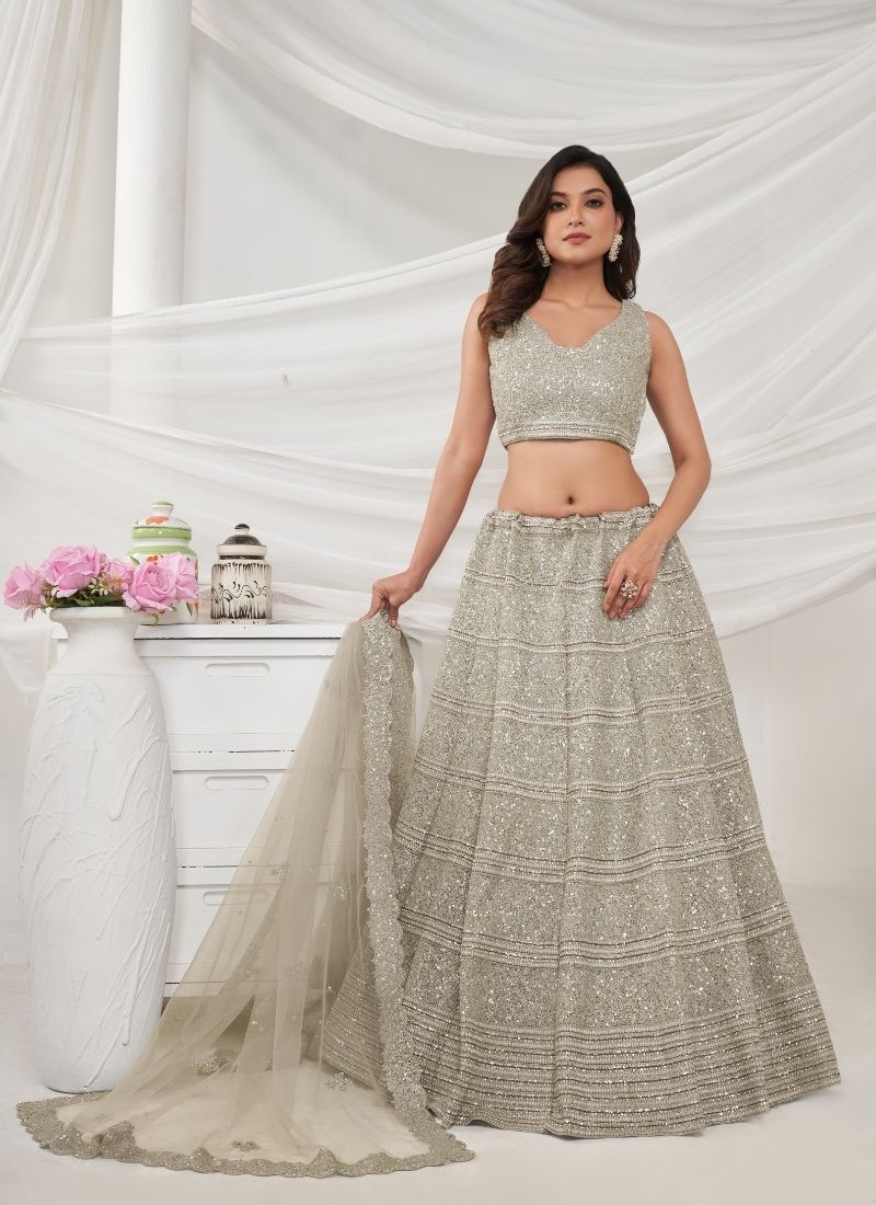 Graceful Lenega embedded by Thread and Sequin Embellished Lehengas in olive green