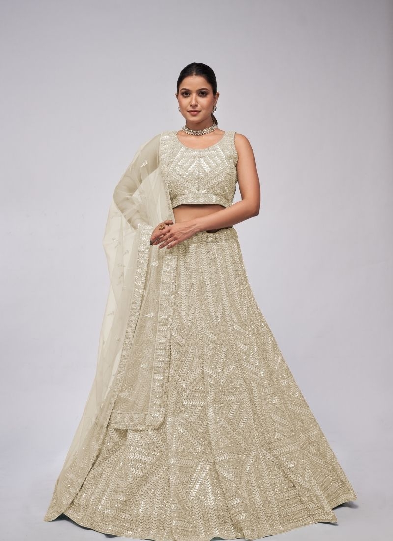 Elegant Ensemble leaves motifs sequins lehenga sangeet ceremony in off white