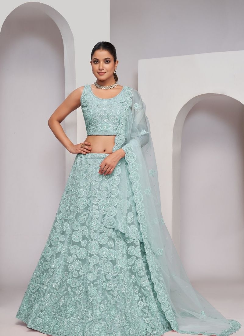 Girlish floral pattern thread and sequins work elegant lehenga in teal green