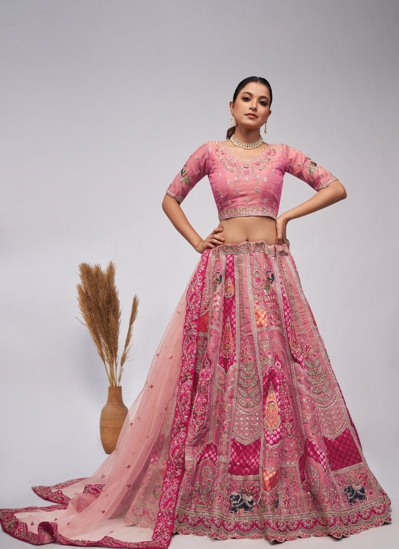 Elegant Peacock and Paisley motifs Silk traditional lehenga choli in dark pink