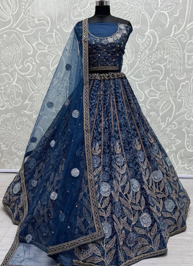 Heavy embroidered bridal lehenga in net with designer net dupatta  in blue