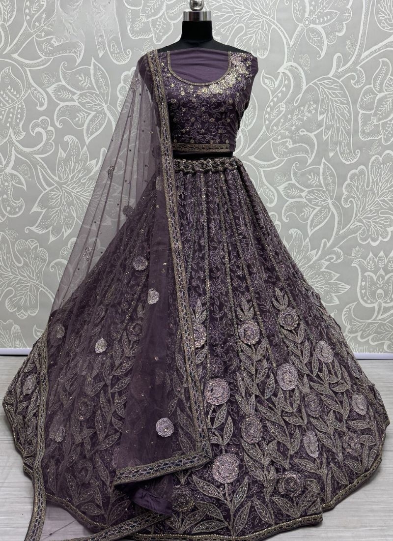 Heavy embroidered bridal lehenga in net with designer net dupatta  in violet