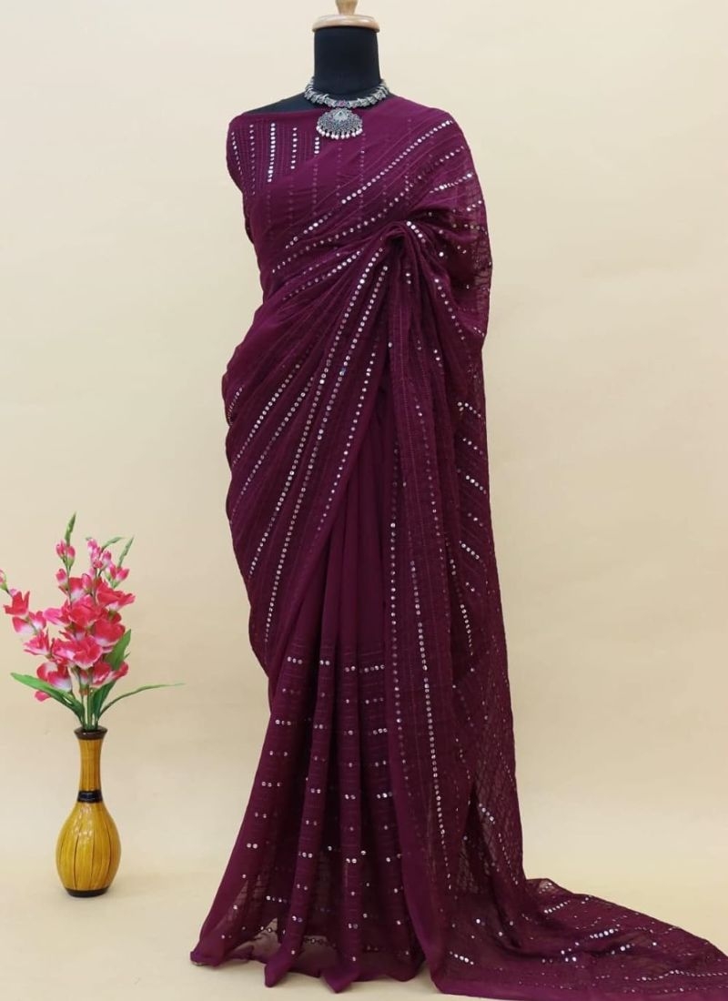 Stunning embroidered georgette saree in maroon