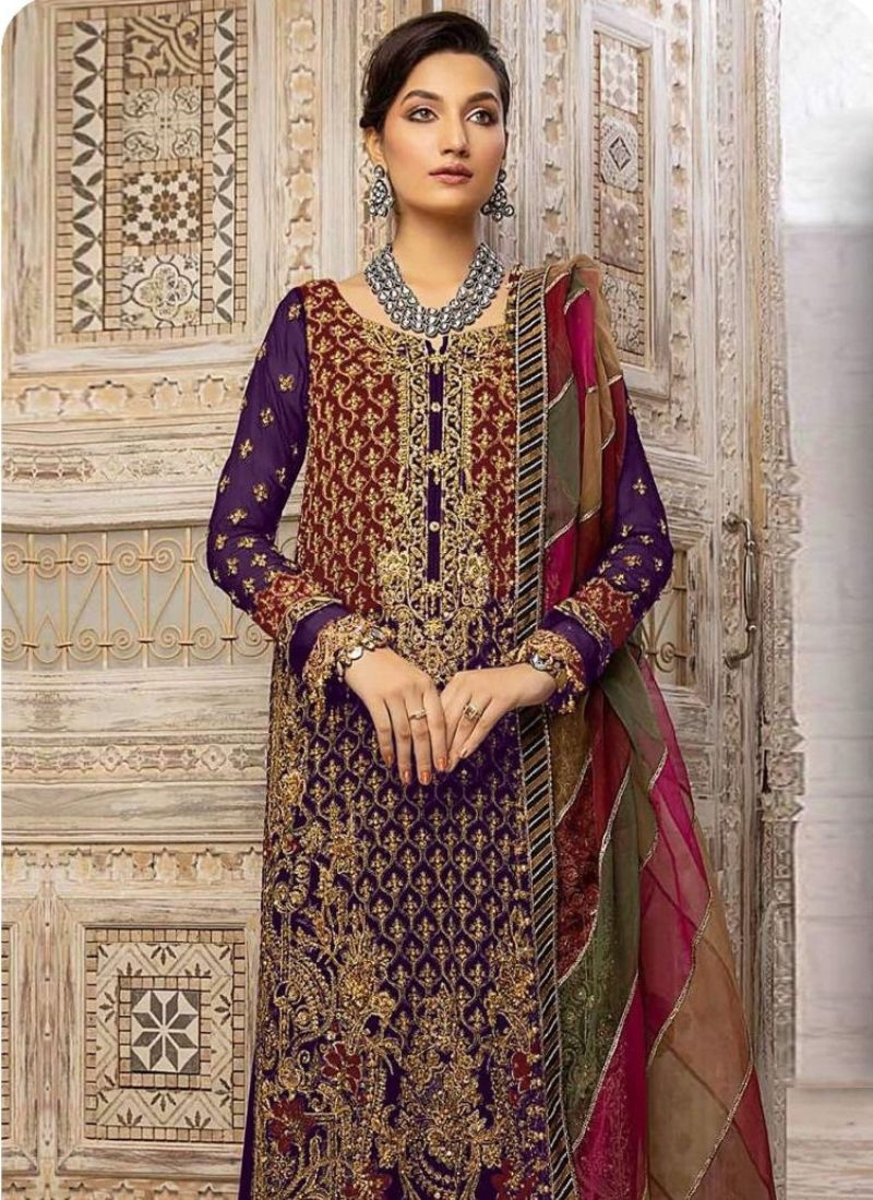 Beautiful embroidered georgette palazzo suit in dark purple