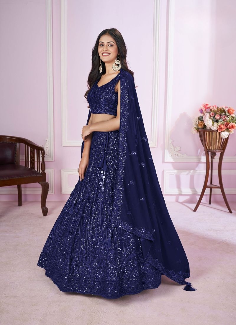 Exquisite embroidered georgette lehenga choli with net dupatta in navy blue