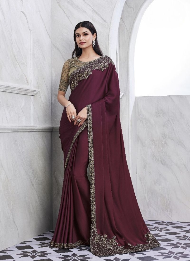 Exquisite embroidered silk saree in maroon