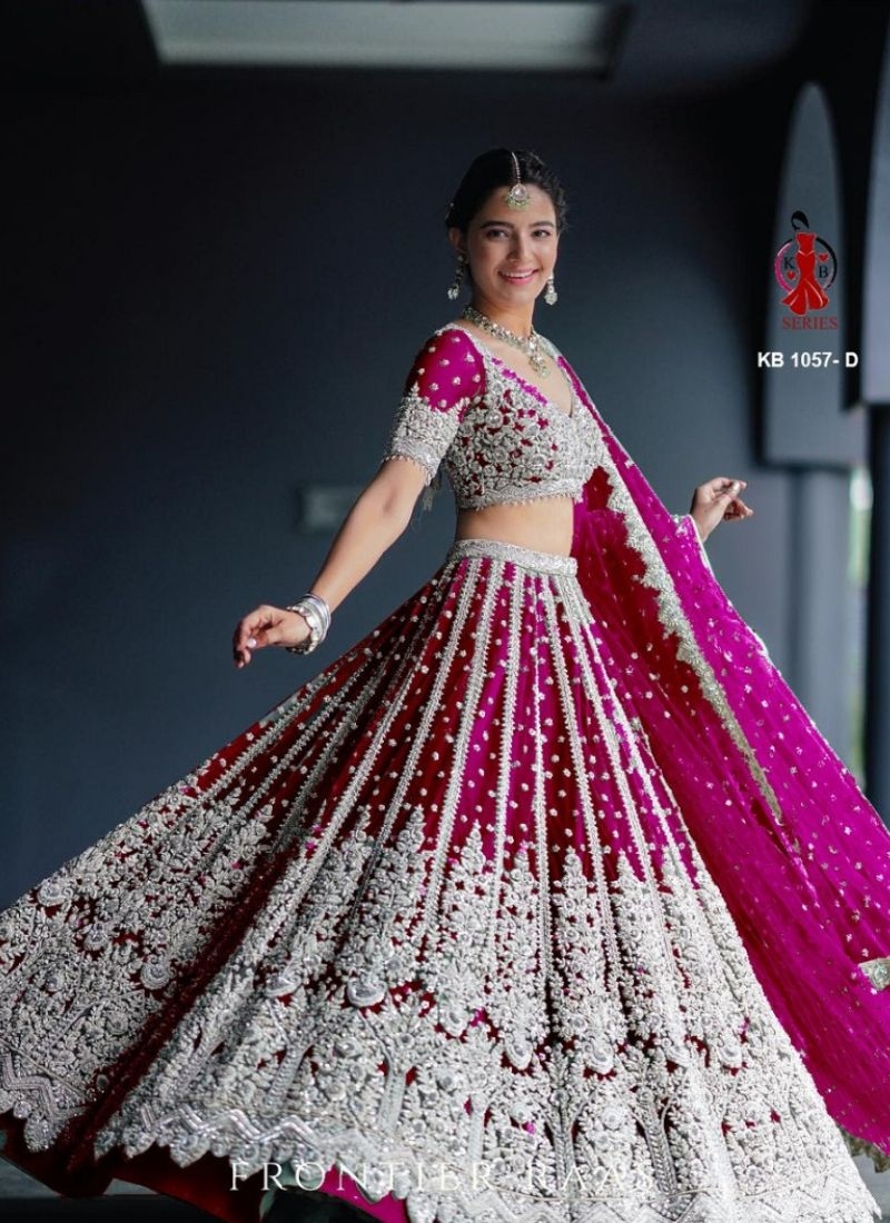 Beautiful embroidered butterfly net lehenga choli in dark pink