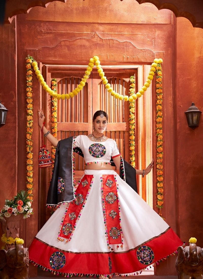 Exquisite mirror embroidered silk lehenga choli in white