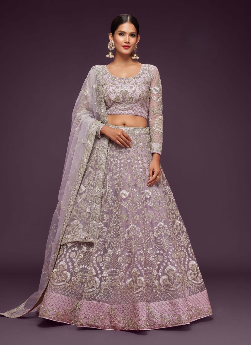 The gorgeous embroidered net lehenga choli in light purple