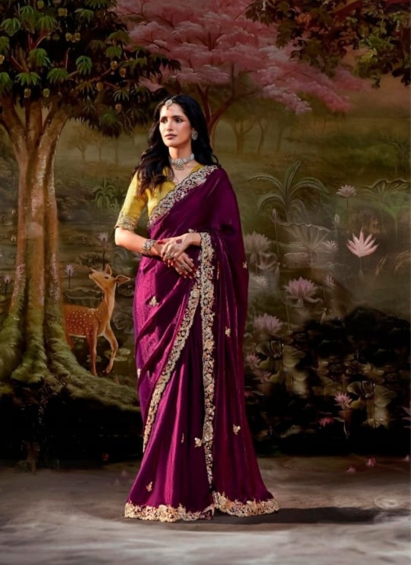 Stunning embroidered chiffon saree in wine