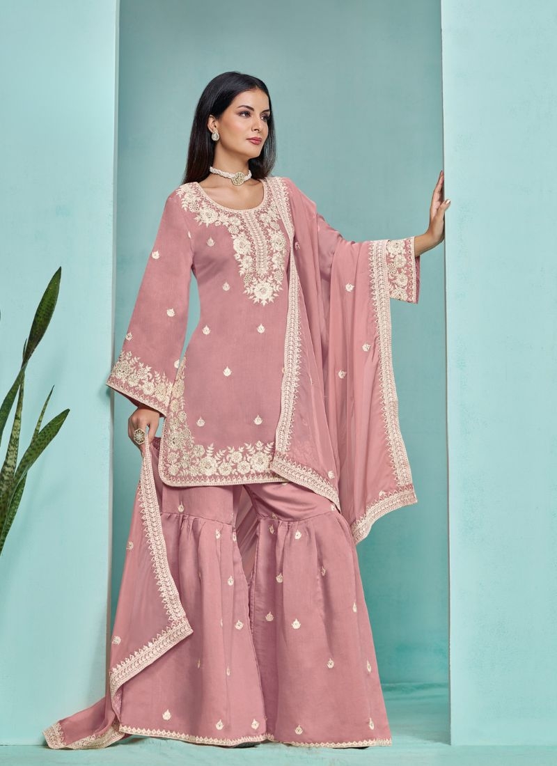 Stunning heavy embroidered sharara suit in peach pink