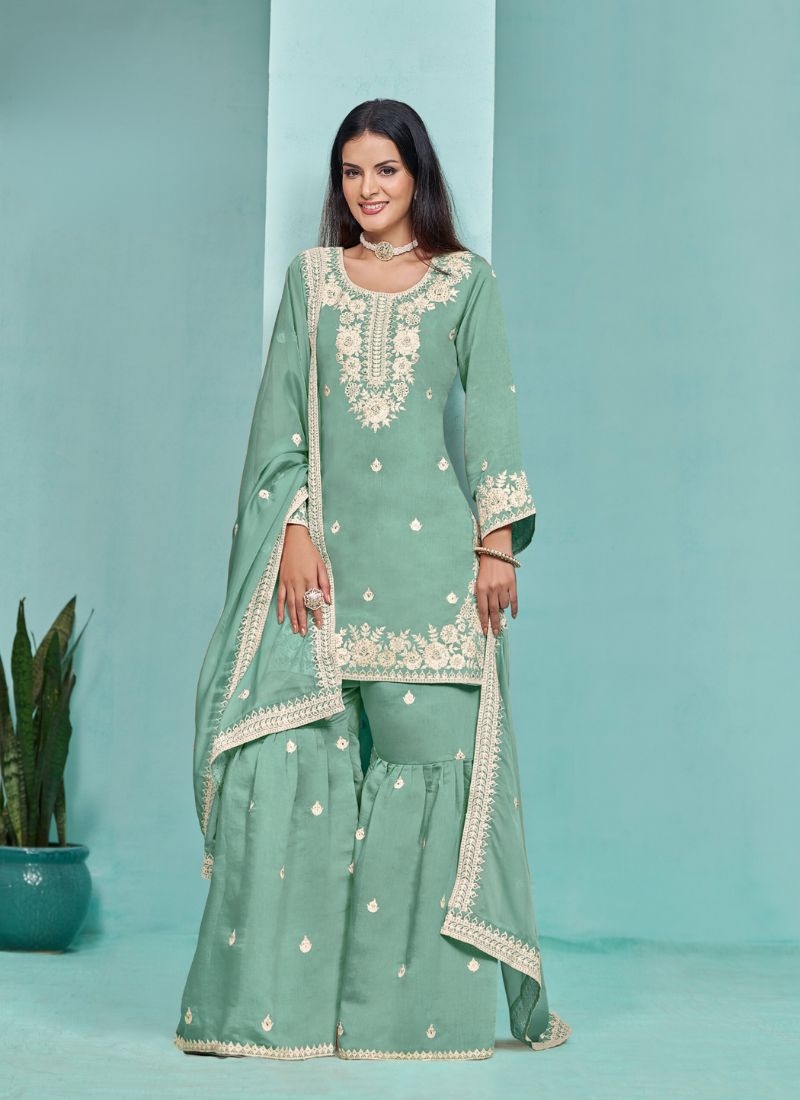 Stunning heavy embroidered sharara suit in green