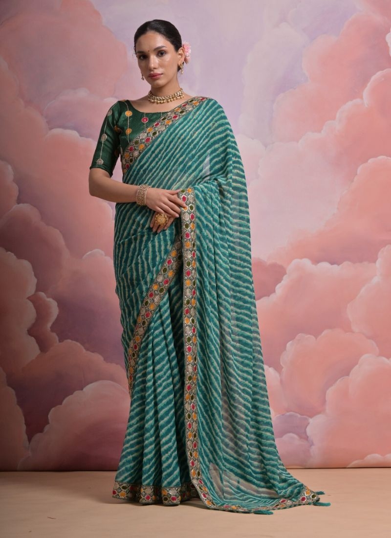 Beautiful embroidered georgette saree in green