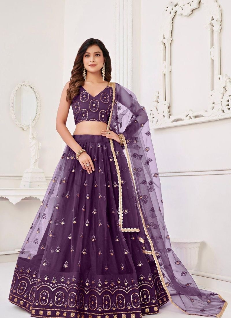 Stunning embroidered net lehenga choli in purple