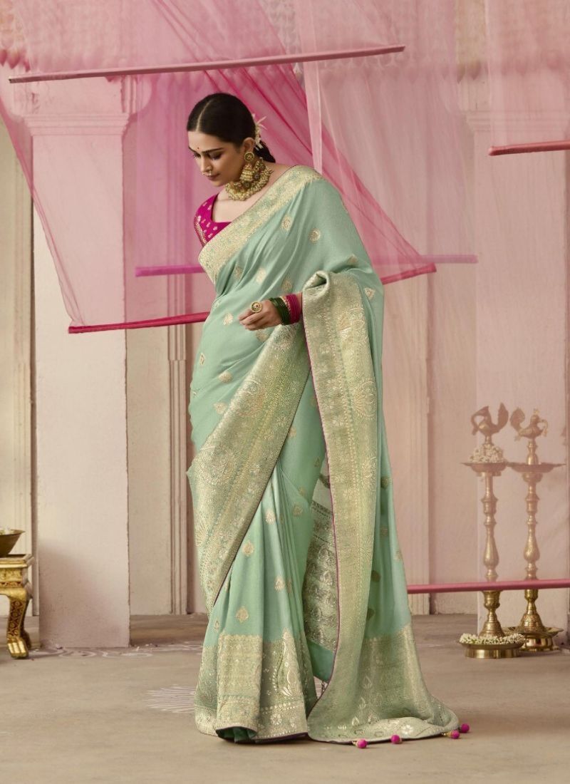 Exquisite dola silk saree with meenakari weaving in light green