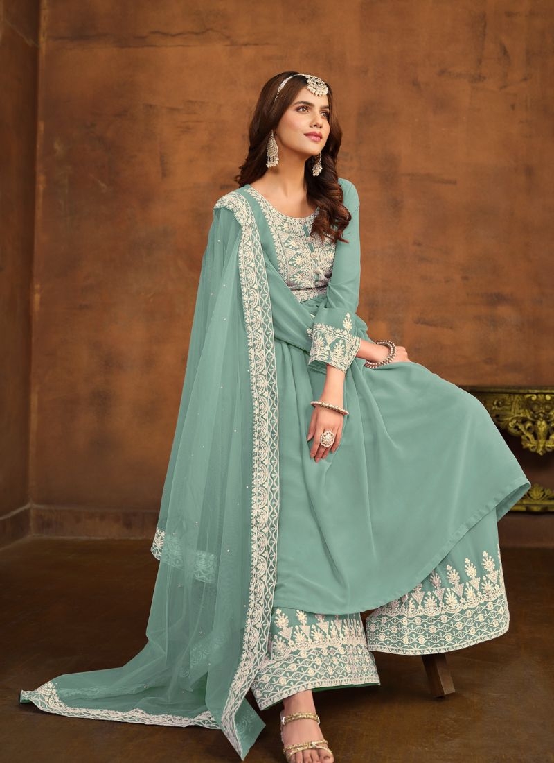 Beautiful embroidered faux georgette palazzo suit in sage green