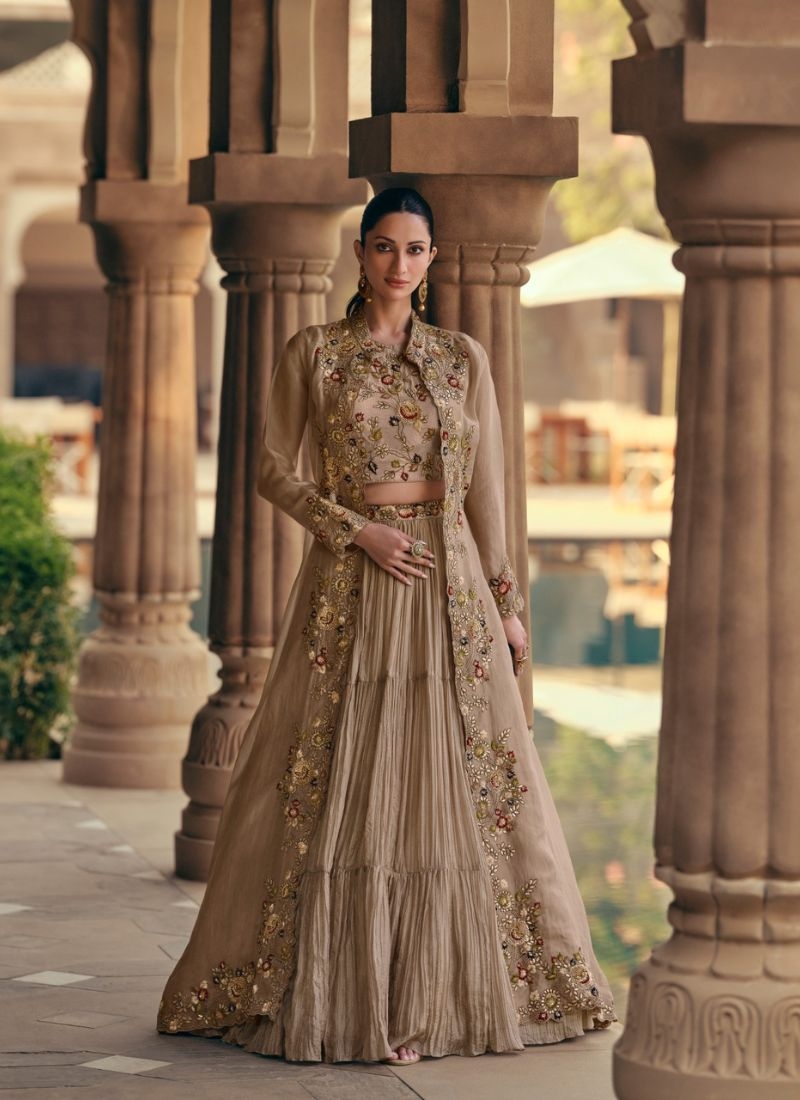 Beautiful hand embroidered lehenga choli with shrug in beige