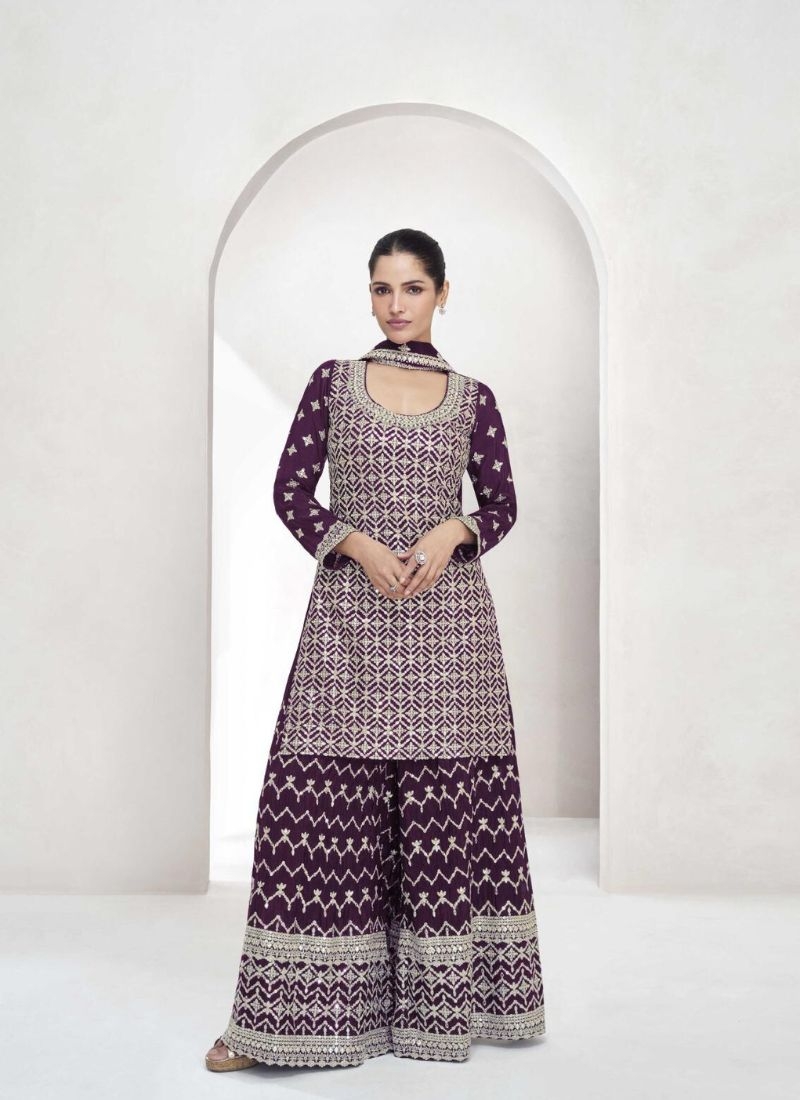 Exquisite thread embroidered sharara suit in dark purple