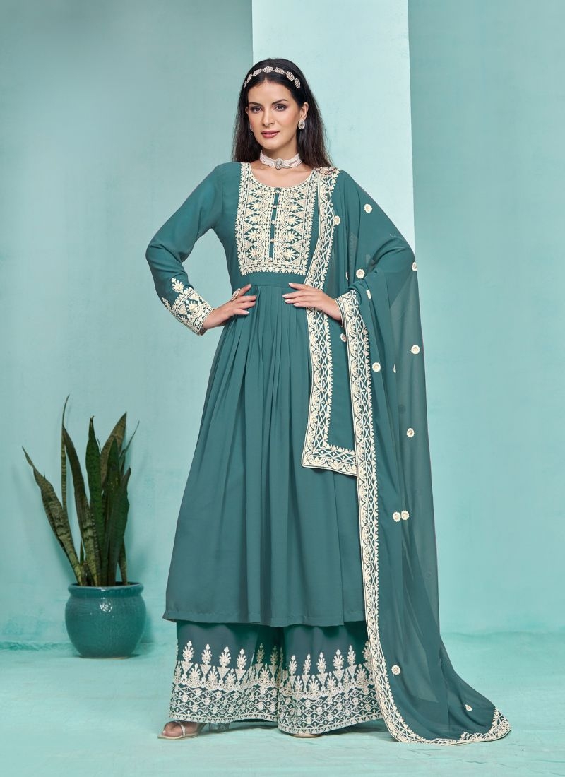 Stunning heavy embroidered georgette sharara suit in dark green