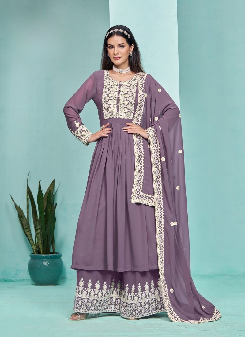 Stunning heavy embroidered georgette sharara suit in purple