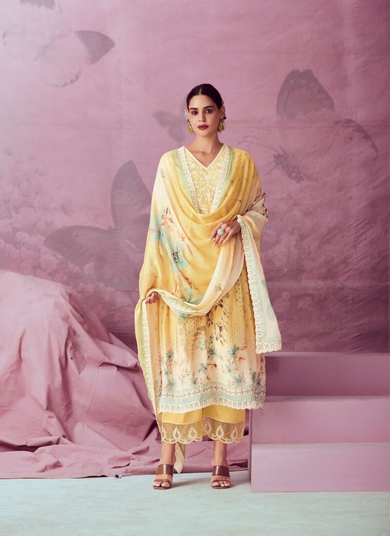 Beautiful embroidered pure muslin kurta pant suit in yellow