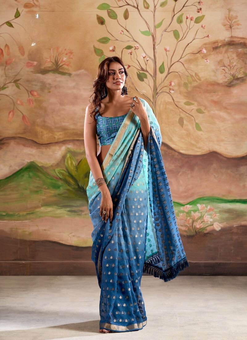 Digitally printed zari weaving georgette silk saree in sky blue