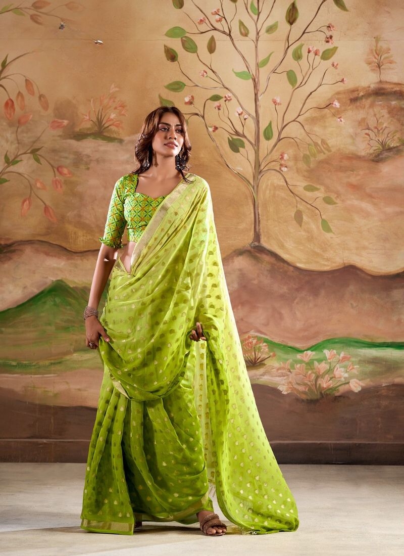 Digitally printed zari weaving georgette silk saree in light green