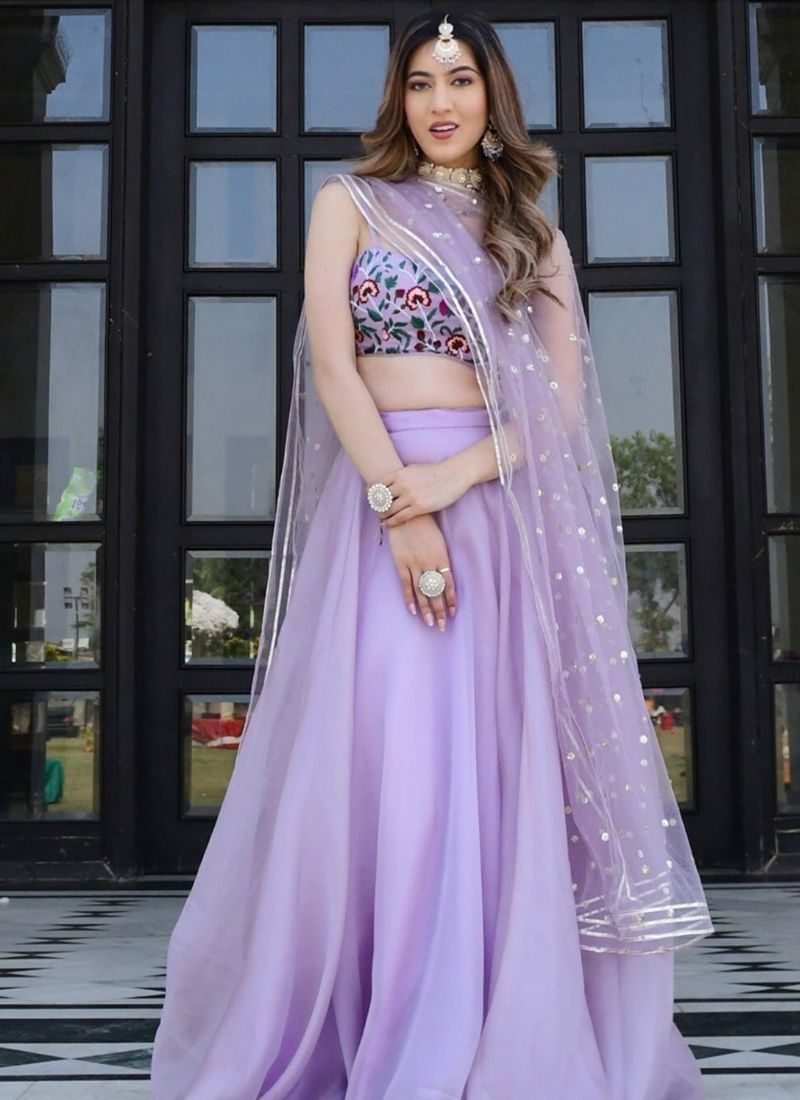 Beautifully embroidered organza silk lehenga choli in purple