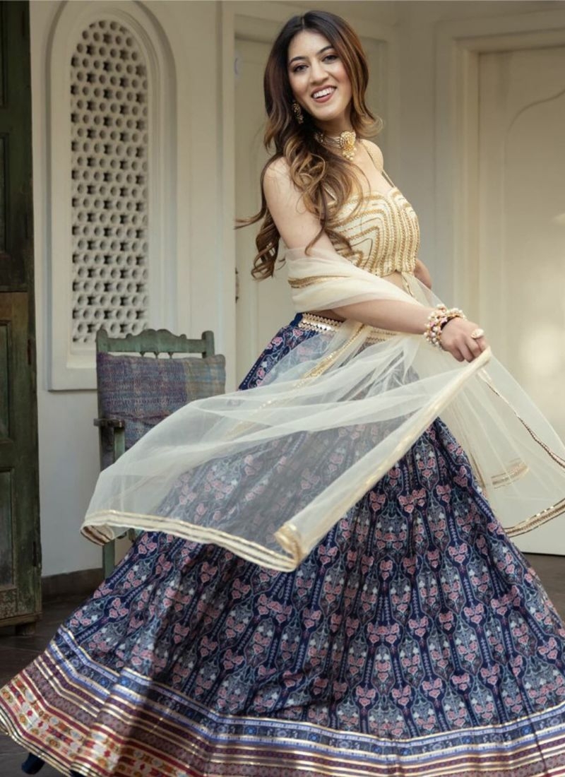 Beautifully embroidered organza silk lehenga choli in blue